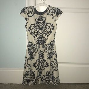 white and black patterned dress